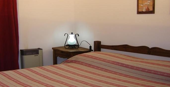 Una cama o camas en una habitación de Chawasi Apart
