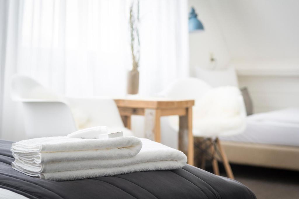 Postel nebo postele na pokoji v ubytování B&B Boutique Hotel De Waal