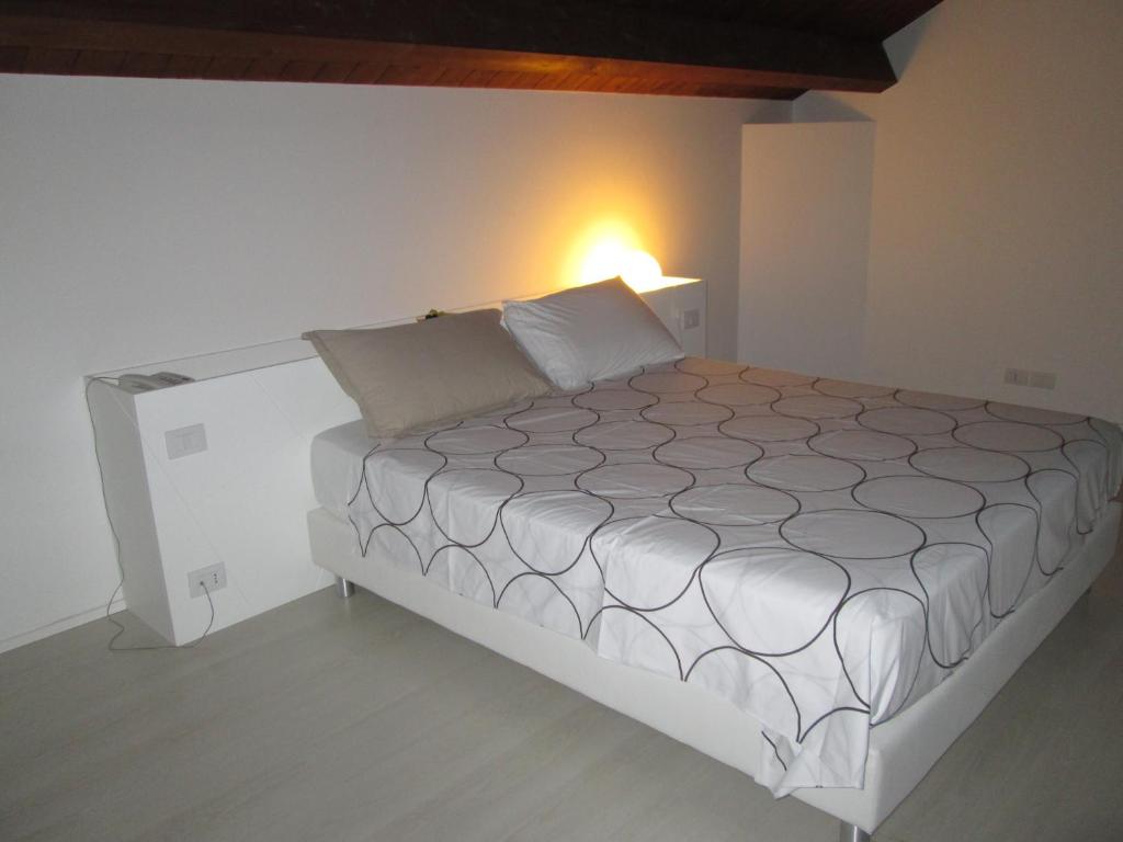 Postel nebo postele na pokoji v ubytování Cantina Loft