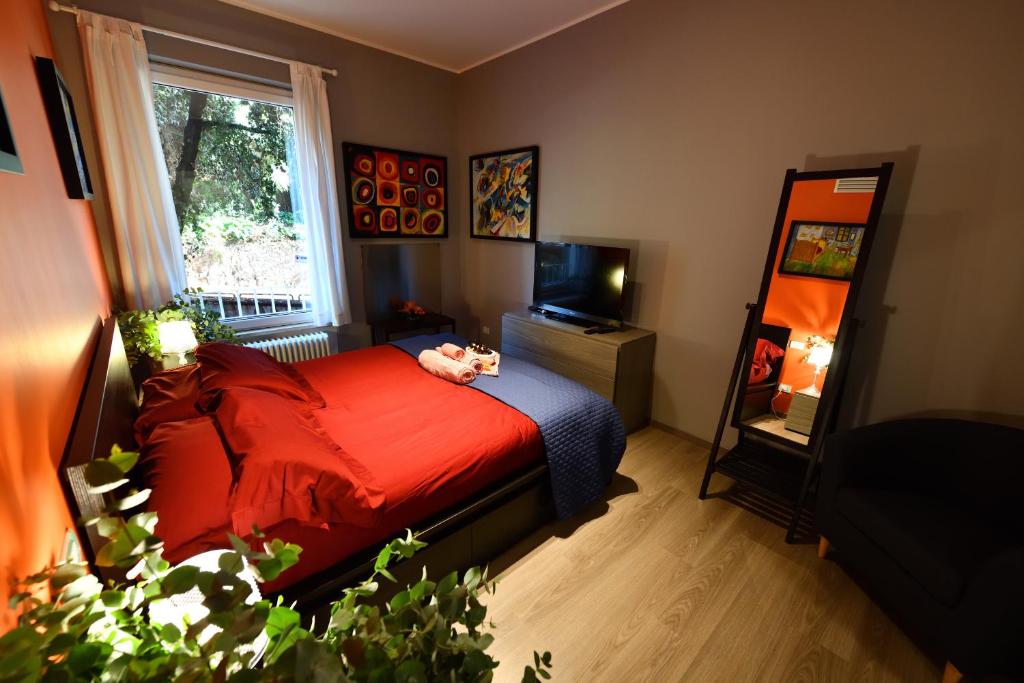 Telewizja i/lub zestaw kina domowego w obiekcie The Roman Residence