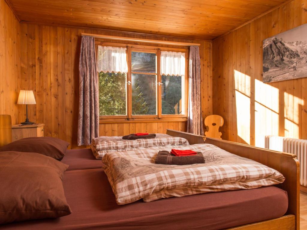 Postel nebo postele na pokoji v ubytování Gasthaus Göscheneralp