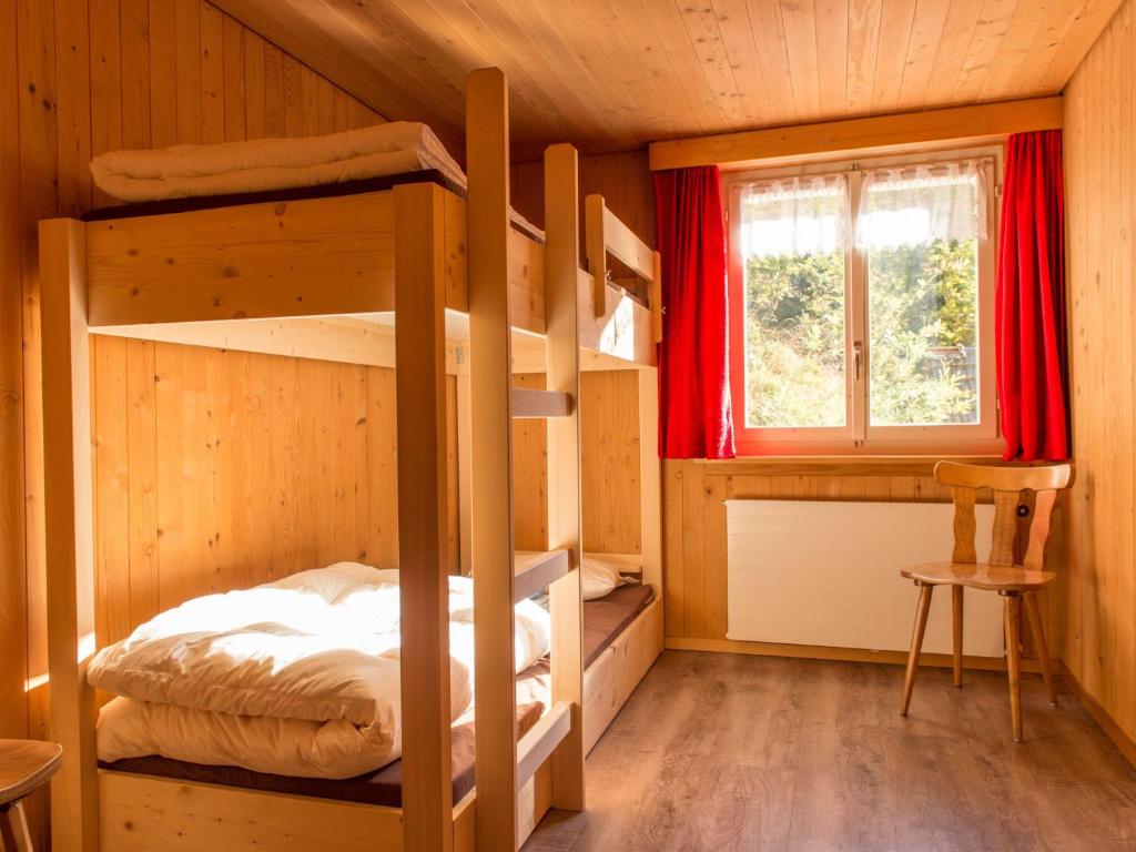 Postel nebo postele na pokoji v ubytování Gasthaus Göscheneralp