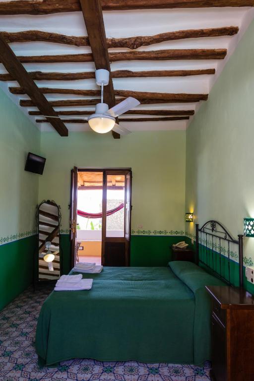 Postel nebo postele na pokoji v ubytování Hotel Arcangelo - Salina