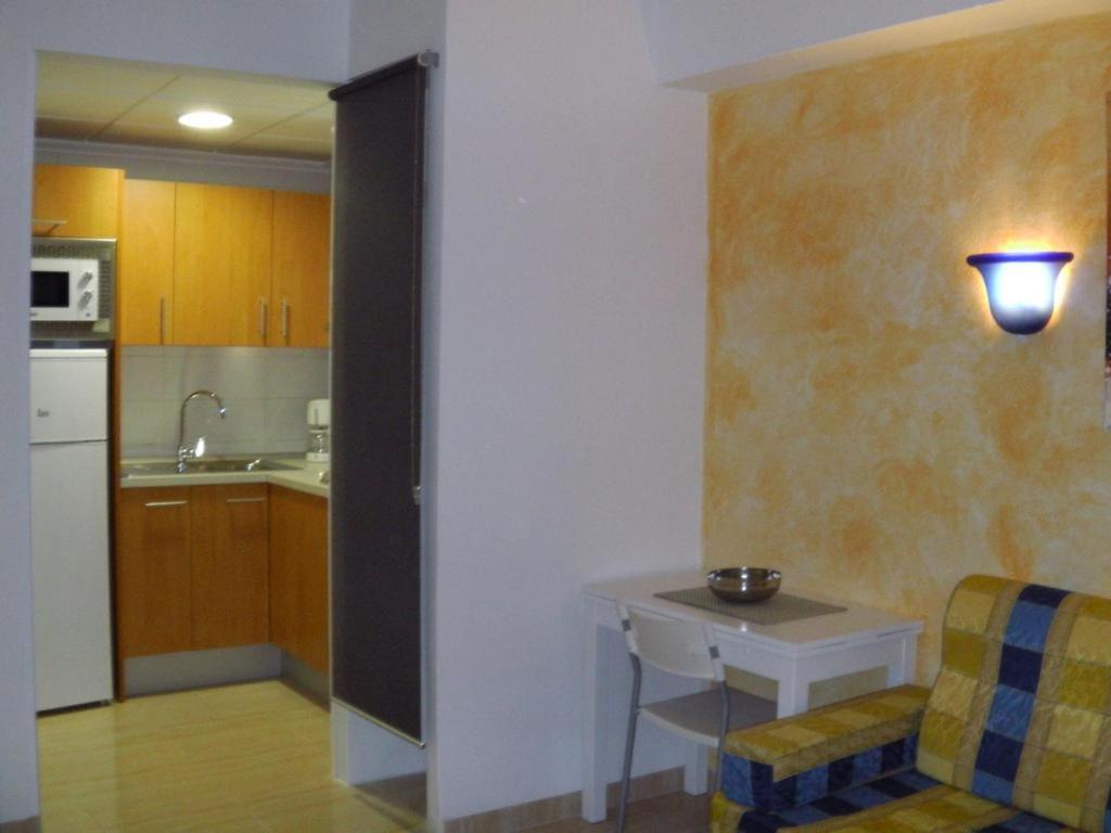 A kitchen or kitchenette at Hotel Alfonso