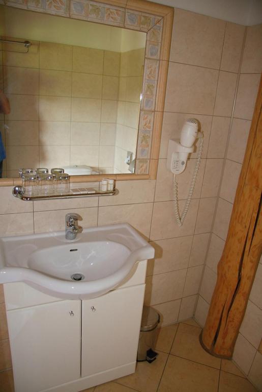 Koupelna v ubytování Hotel Grůň