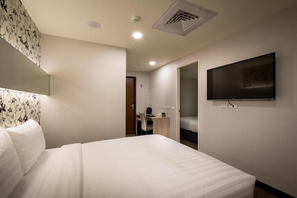 TV a/nebo společenská místnost v ubytování 碩城文旅 SC Hotel