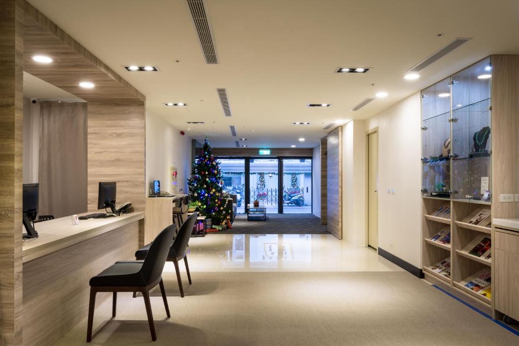 TV a/nebo společenská místnost v ubytování 碩城文旅 SC Hotel
