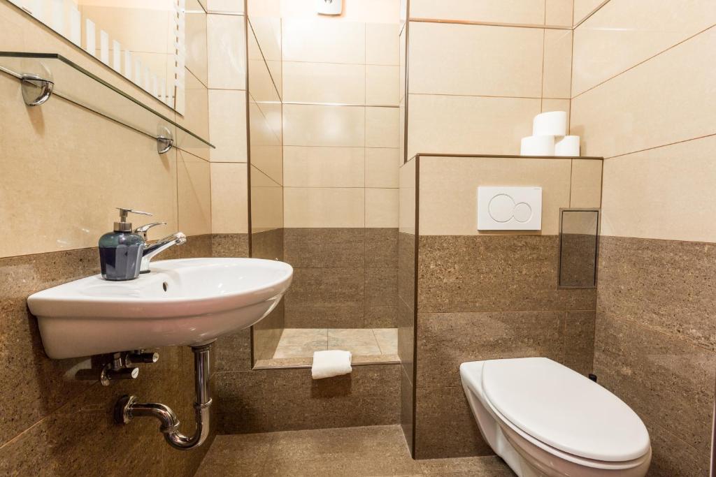 Koupelna v ubytování Rezidence Davids Apartments