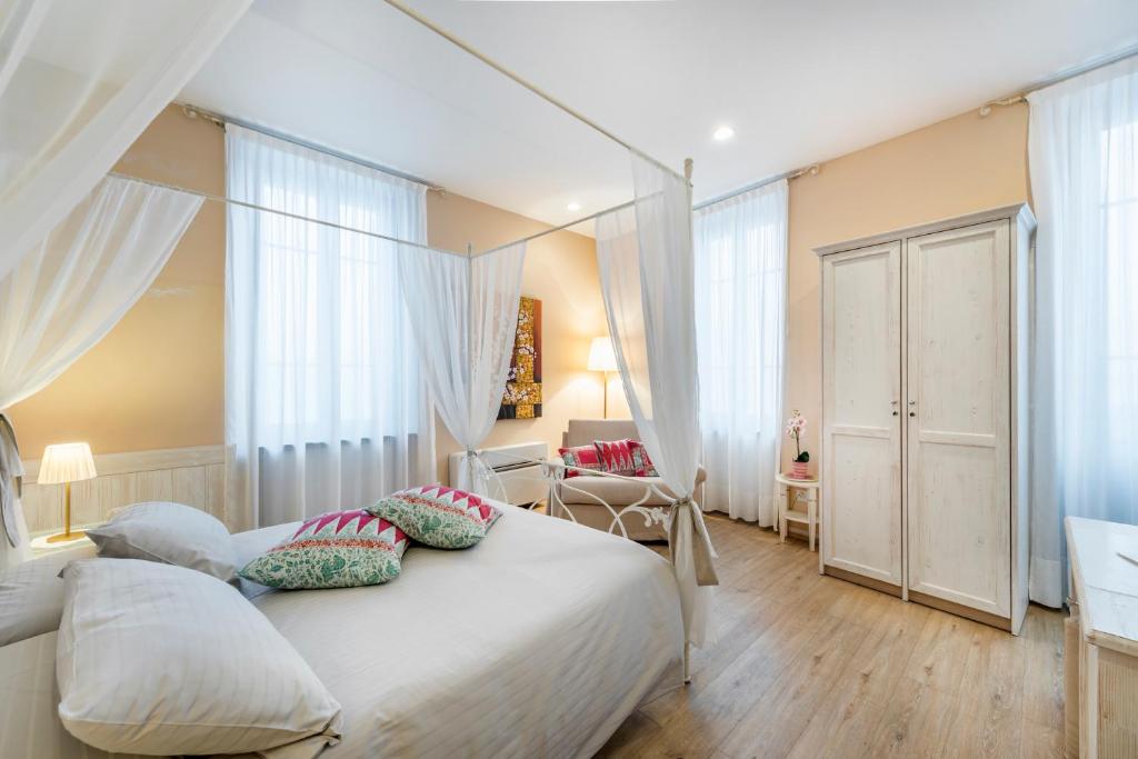 Letto o letti in una camera di Albergo Ristorante La Palma