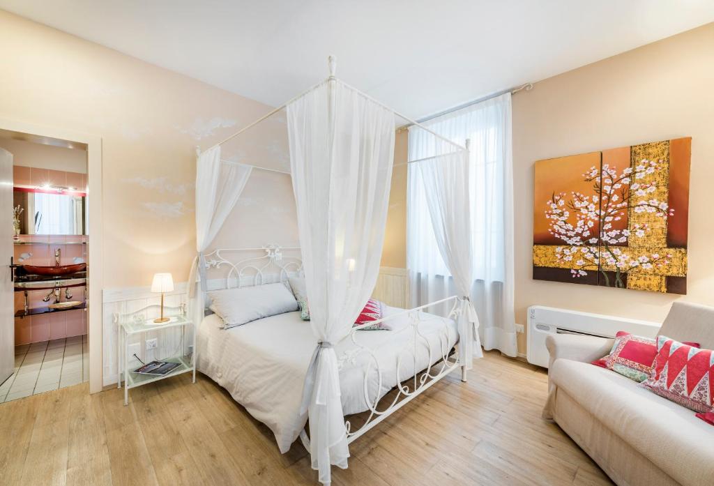 Letto o letti in una camera di Albergo Ristorante La Palma