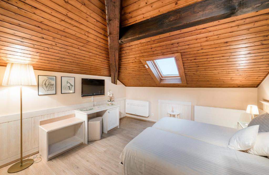 Letto o letti in una camera di Albergo Ristorante La Palma