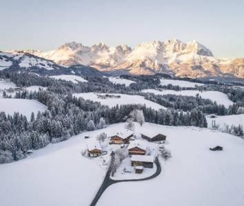 an aerial view of a ski resort in the snow at Hof Hintererb in Kitzbühel