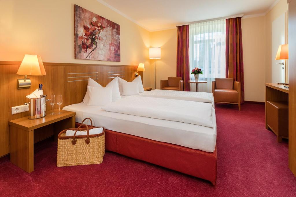 Кровать или кровати в номере Hotel Vis à vis
