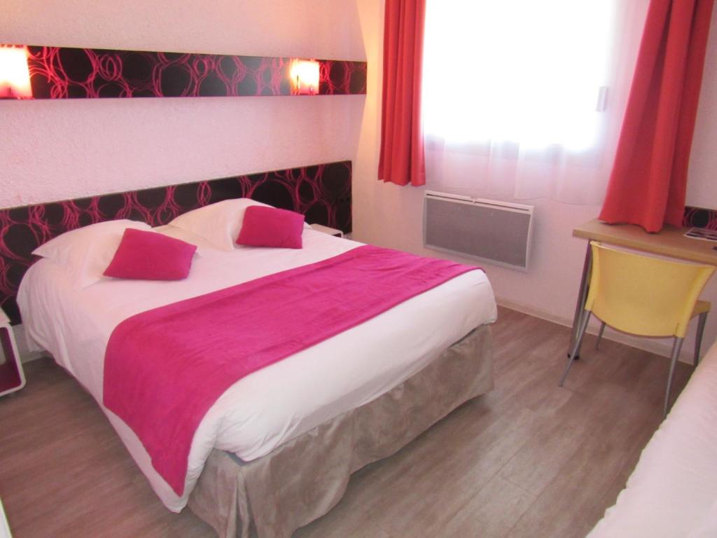 Postel nebo postele na pokoji v ubytování Citotel Les Sternes