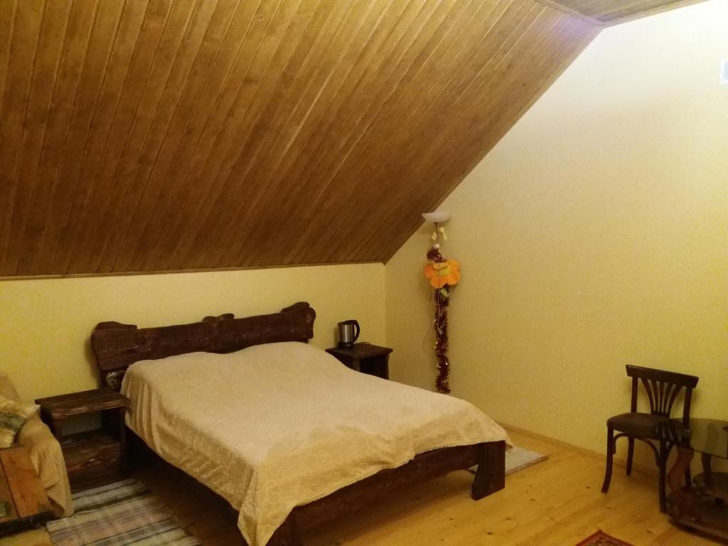 Postel nebo postele na pokoji v ubytování Садиба У Васі