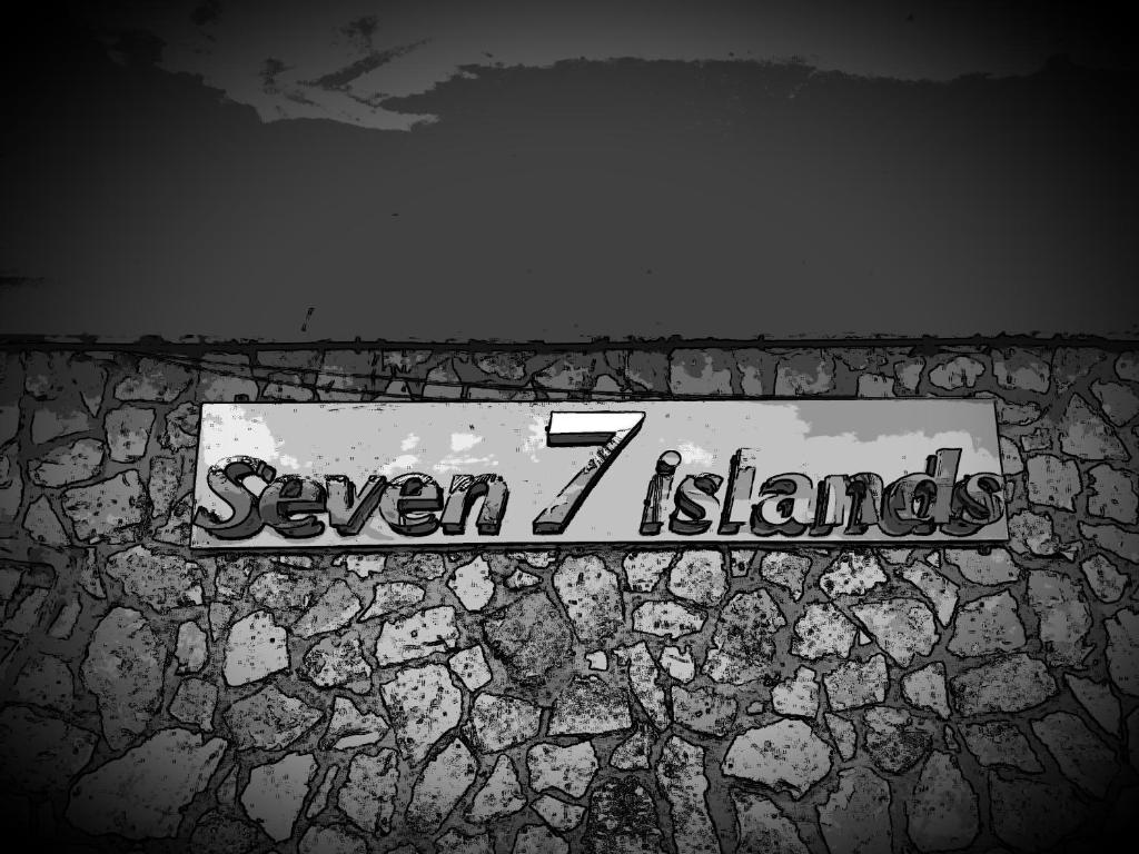 a sign on a wall with the word seven islands at Seven Islands in Gaios