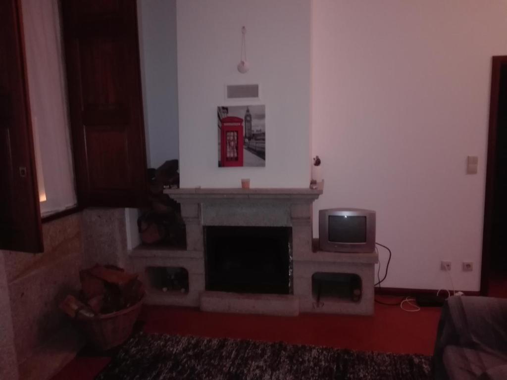 TV a/nebo společenská místnost v ubytování casa cardeal saraiva