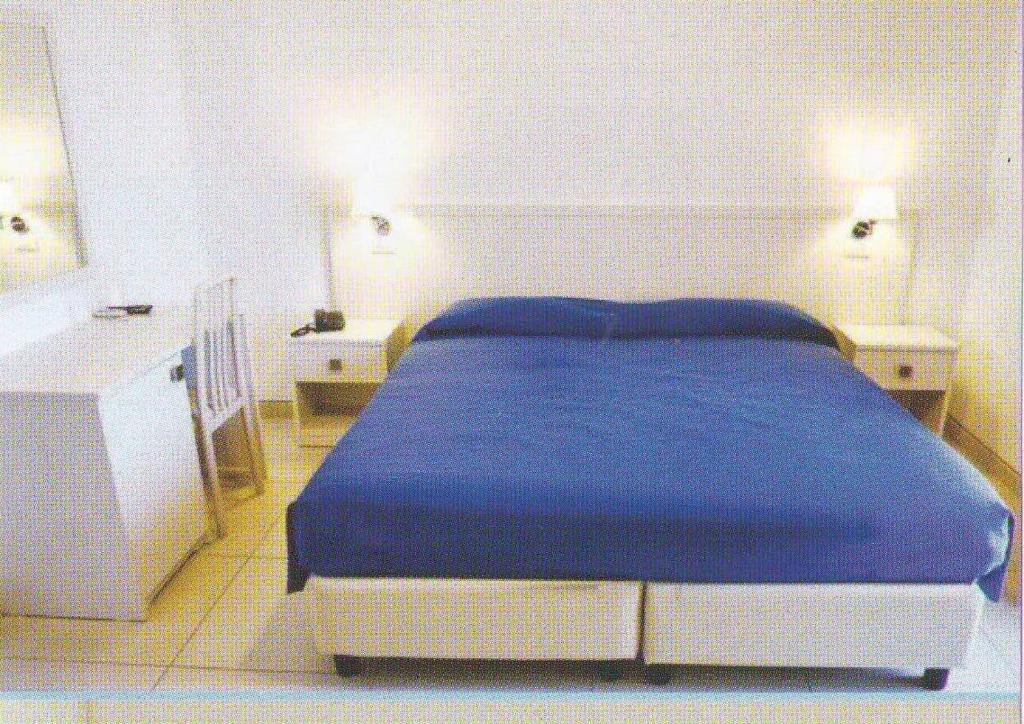 Postel nebo postele na pokoji v ubytování Hotel La Terrazza