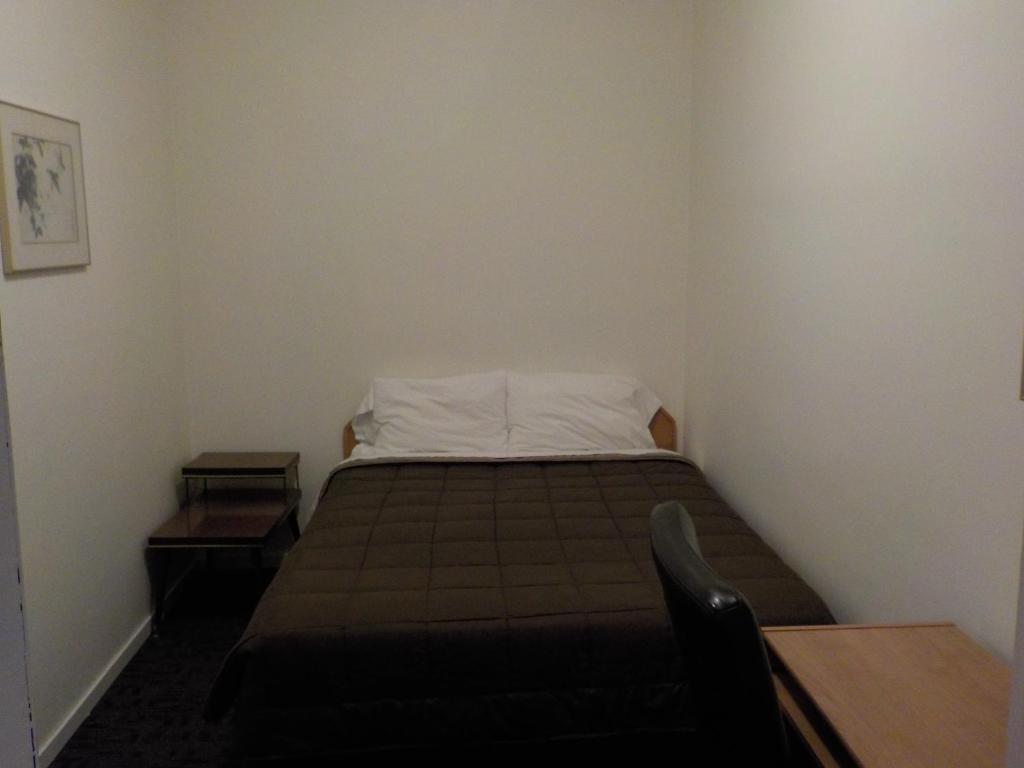 Postel nebo postele na pokoji v ubytování Vernon Hostel