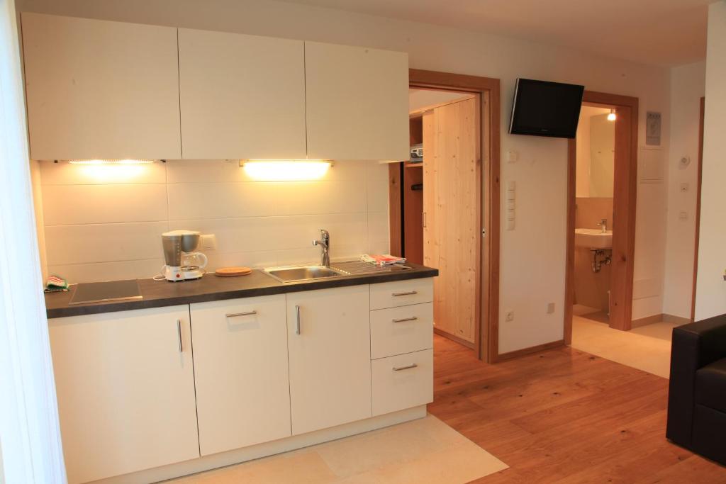 Kuchyň nebo kuchyňský kout v ubytování Appartements Mutschlechner