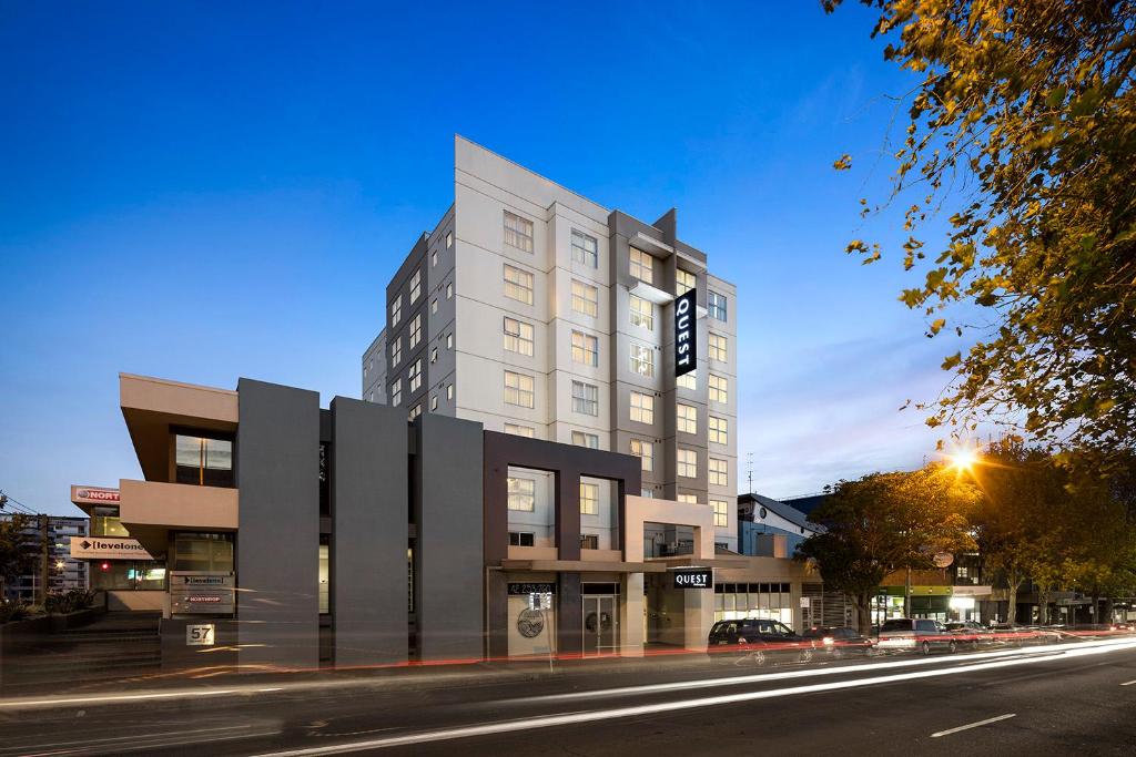 a tall building on a street with a street at Quest Wollongong in Wollongong