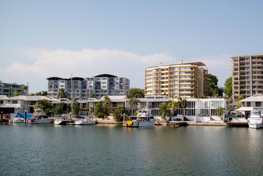 a group of buildings and boats in a marina at Cullen Bay Resorts in Darwin