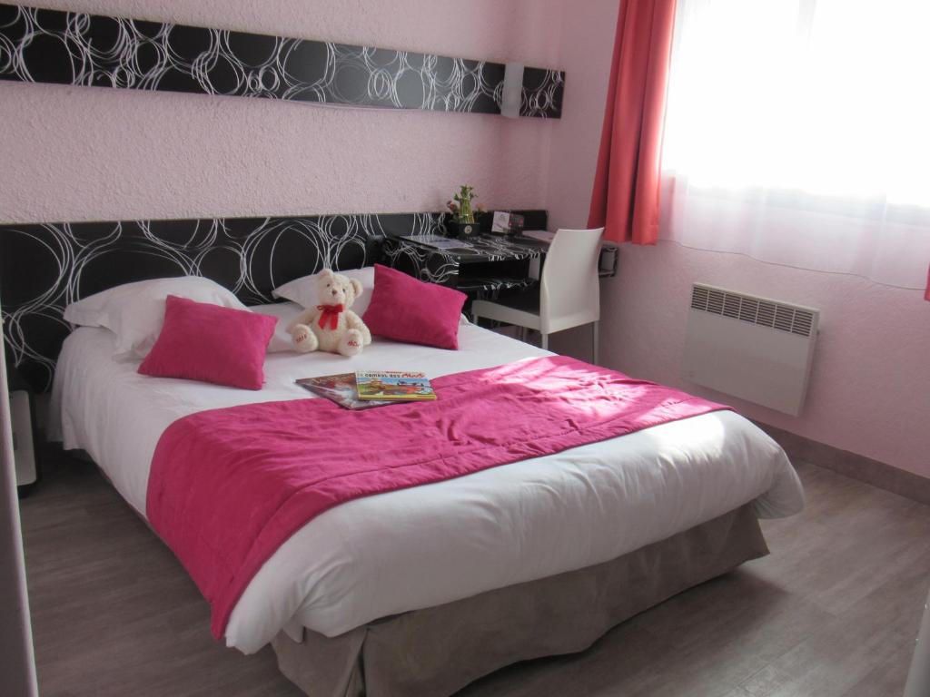 Postel nebo postele na pokoji v ubytování Citotel Les Sternes