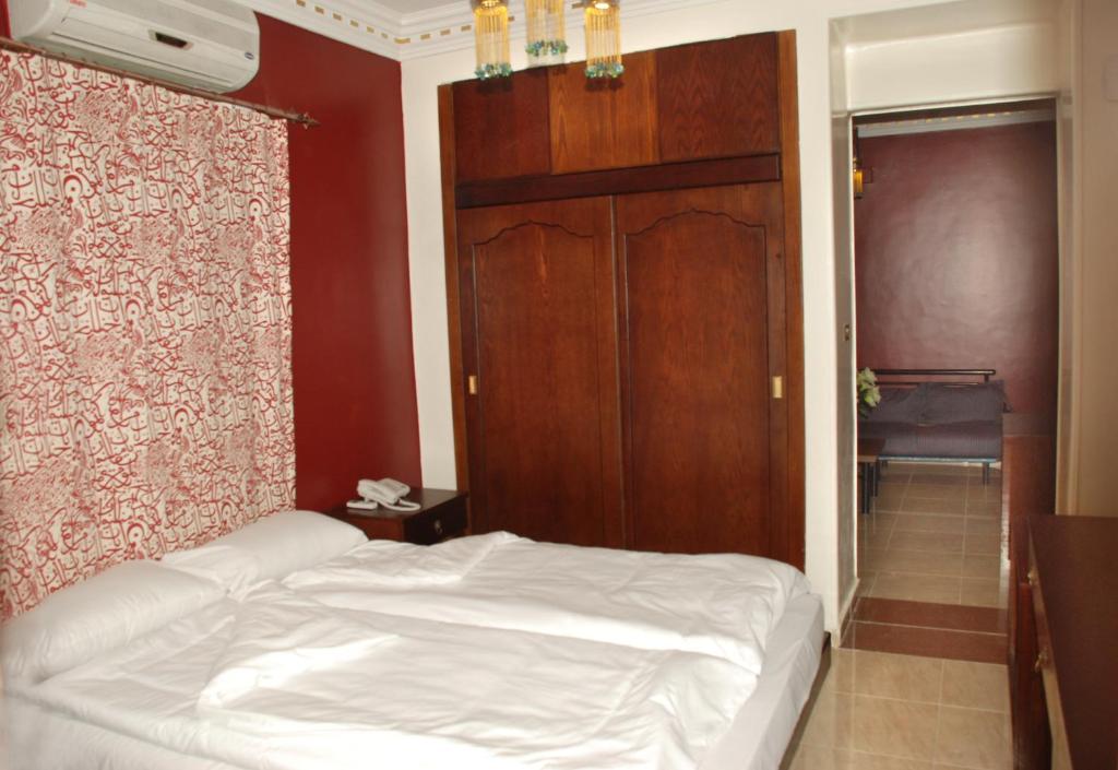 Postel nebo postele na pokoji v ubytování Philae Hotel Aswan