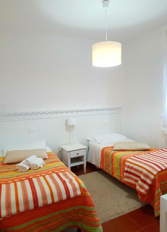 Postel nebo postele na pokoji v ubytování Hotel Porta Romana di Luce Hotels