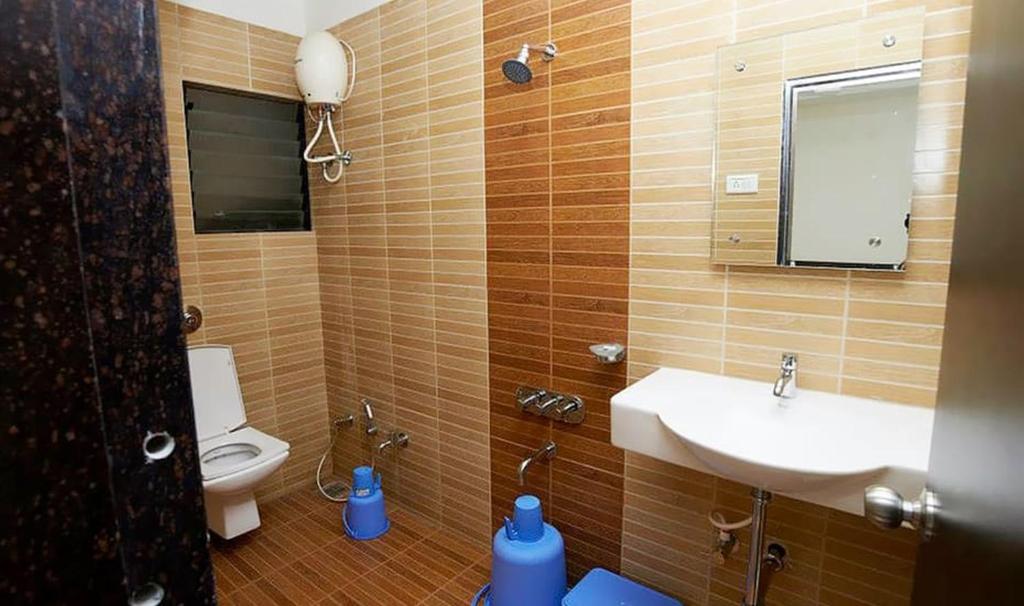 Koupelna v ubytování Hotel Shanti Kamal
