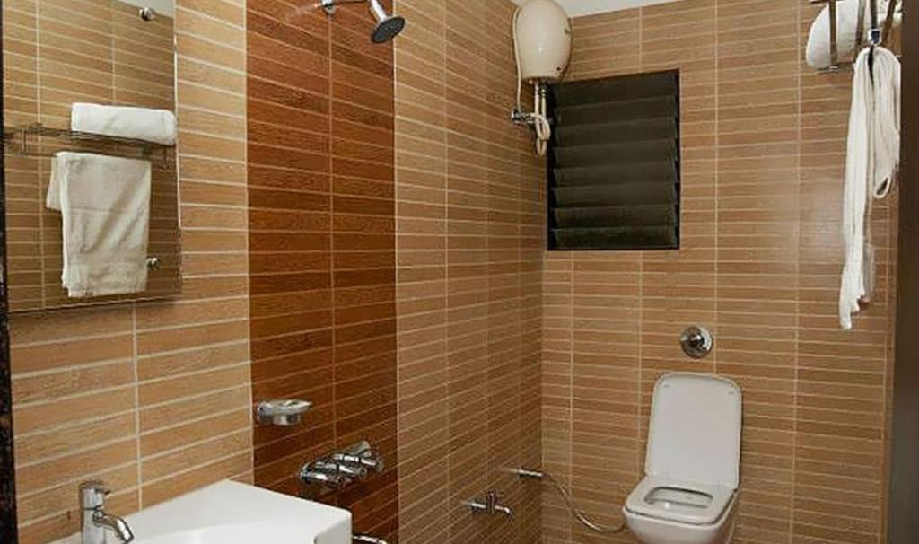 Koupelna v ubytování Hotel Shanti Kamal