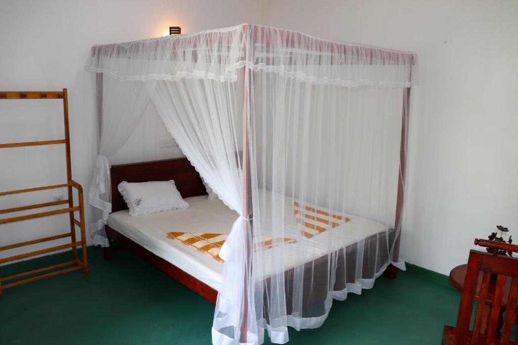 Postel nebo postele na pokoji v ubytování Nature Home