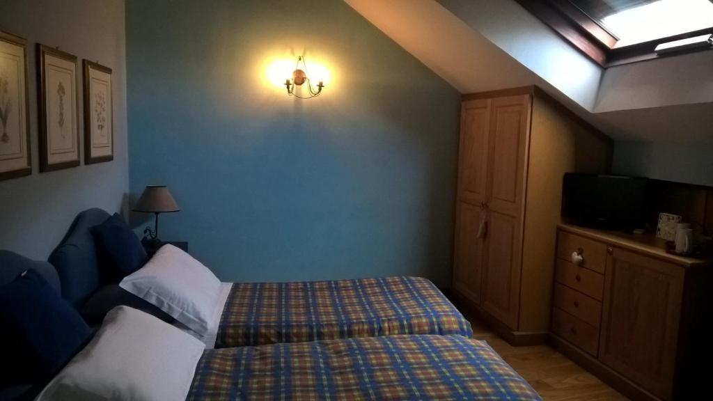 Postel nebo postele na pokoji v ubytování Grancia dei Celestini