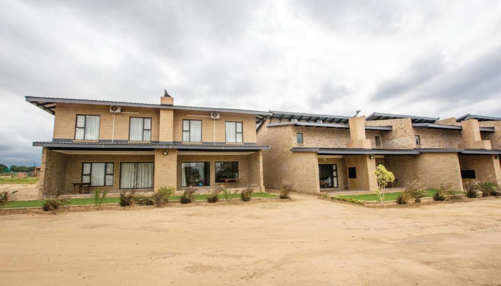 a large brick building with a lot of windows at Hoyohoyo Acorns Lodge in Mission