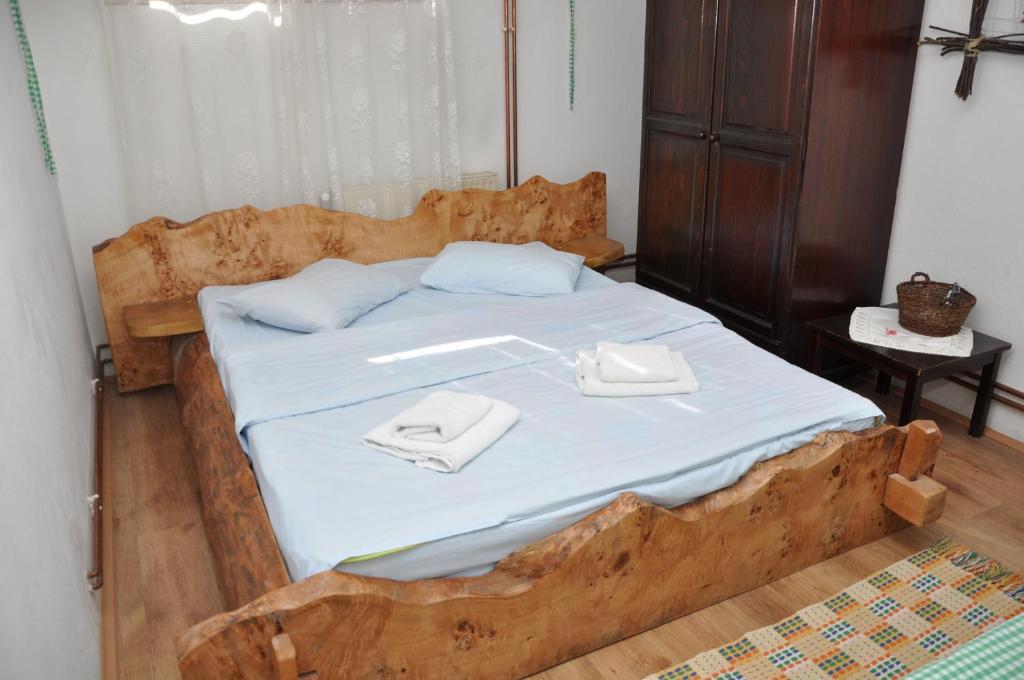Postel nebo postele na pokoji v ubytování Inn Cakmara