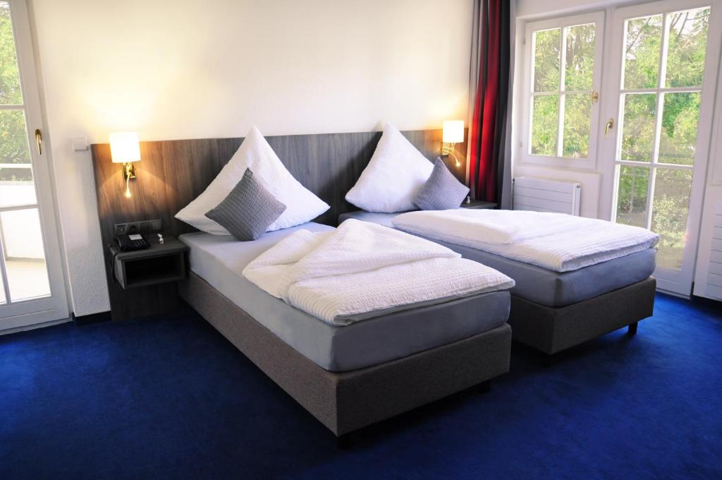 Cama o camas de una habitación en Hotel Krone Überlingen am Ried