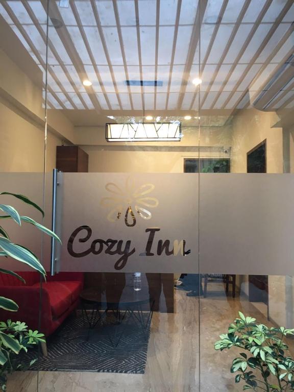 Certifikát, hodnocení, plakát nebo jiný dokument vystavený v ubytování Hotel Cozy Inn