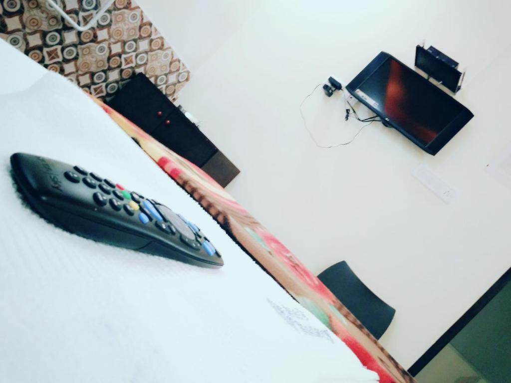 TV a/nebo společenská místnost v ubytování Mani's residency