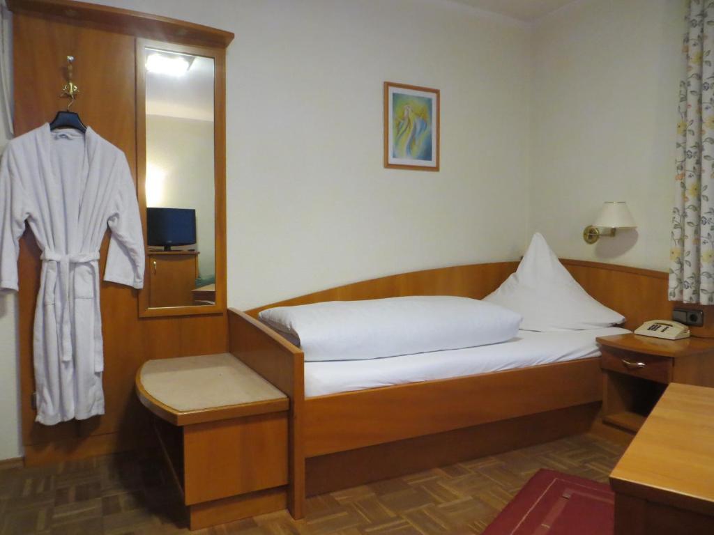 Postel nebo postele na pokoji v ubytování Hotel Cebulj