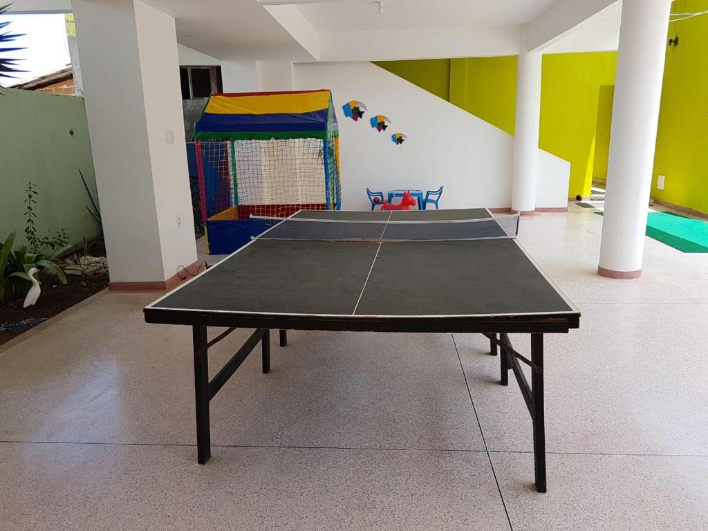 Stolní tenis v ubytování Hotel Pousada Oasis nebo okolí