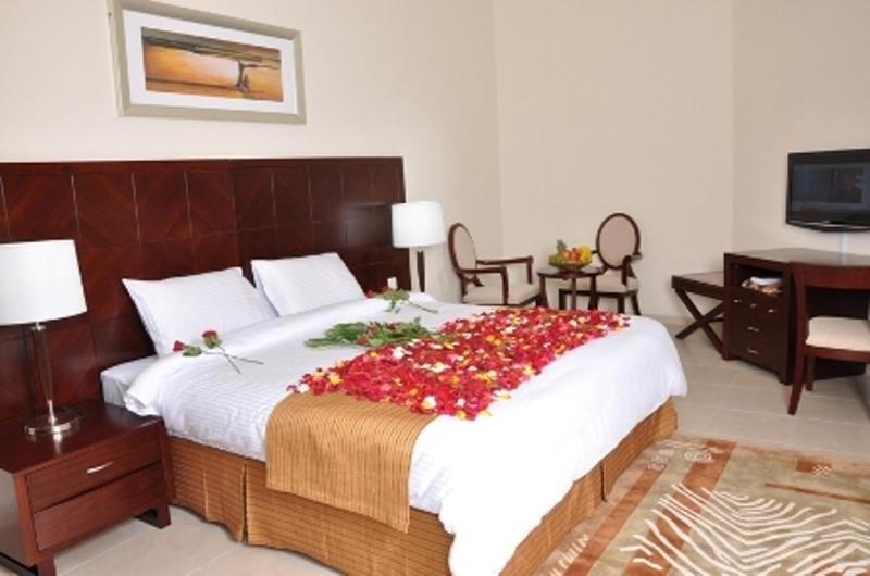 Postel nebo postele na pokoji v ubytování Akas-Inn Hotel Apartment