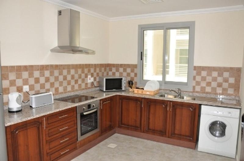Kuchyň nebo kuchyňský kout v ubytování Akas-Inn Hotel Apartment