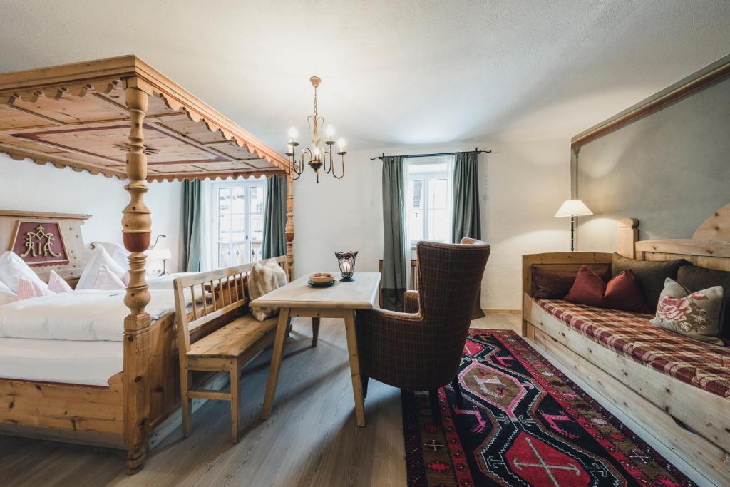 Postel nebo postele na pokoji v ubytování Himmlhof Small Luxury Boutique Hotel