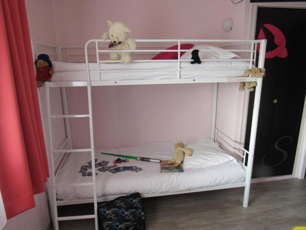 Postel nebo postele na pokoji v ubytování Citotel Les Sternes