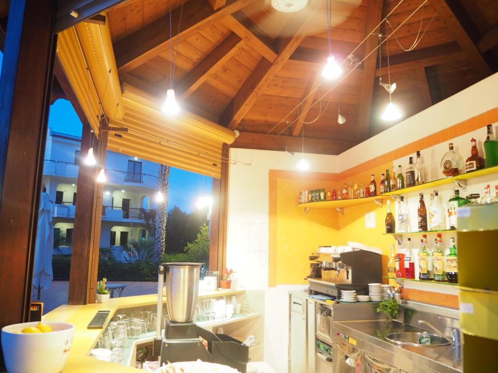 Nápoje v ubytování Oasiclub Hotel - Appartamenti