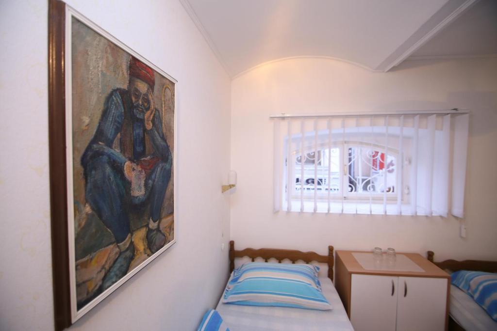 Postel nebo postele na pokoji v ubytování Guesthouse Kod Keme