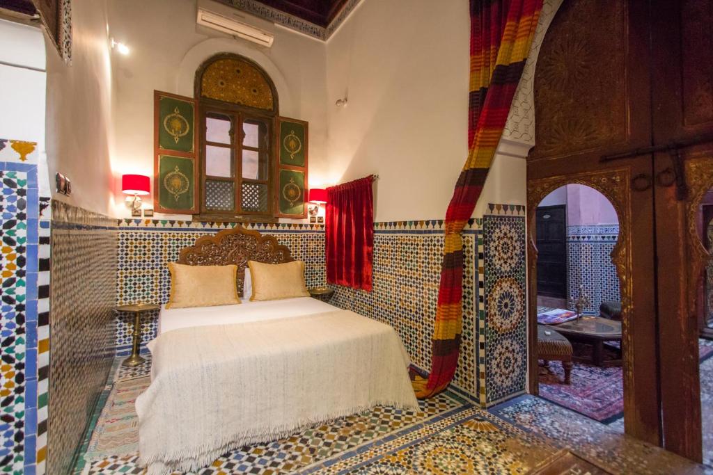 Voodi või voodid majutusasutuse Riad D'or meknes toas