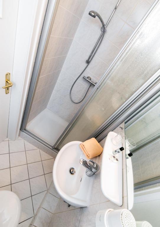 Koupelna v ubytování Hotel Berlin