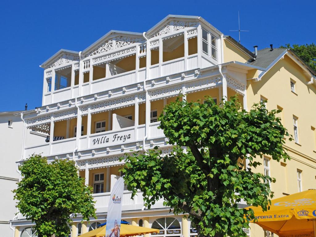 a large building with a white therapy sign on it at Villa Freya - Apt. 07 in Ostseebad Sellin