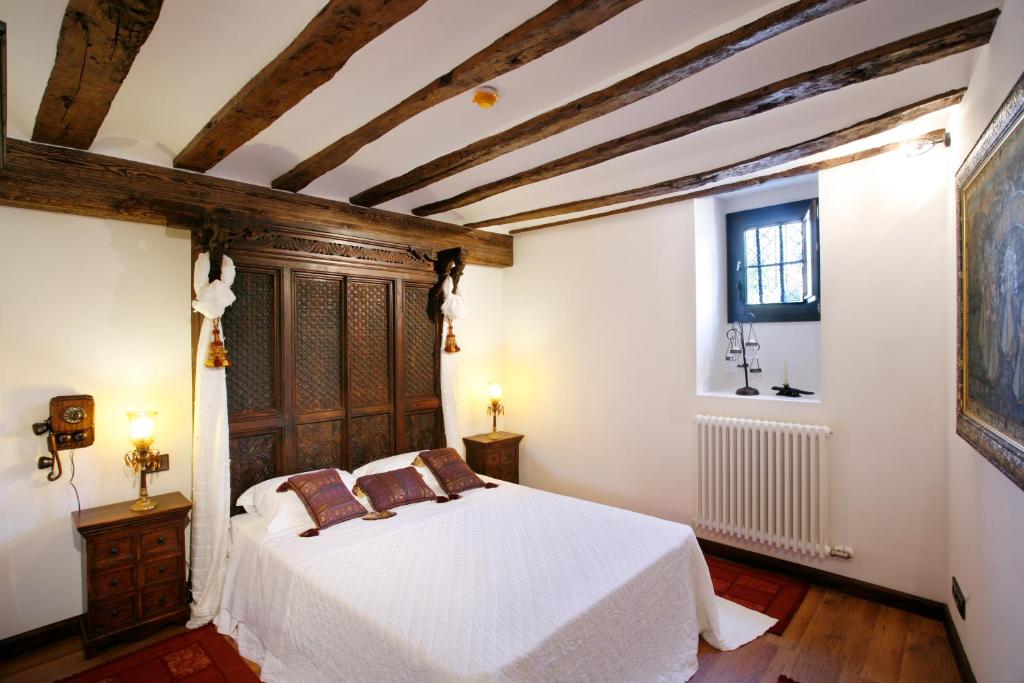 Posteľ alebo postele v izbe v ubytovaní Hotel Boutique Real Casona De Las Amas